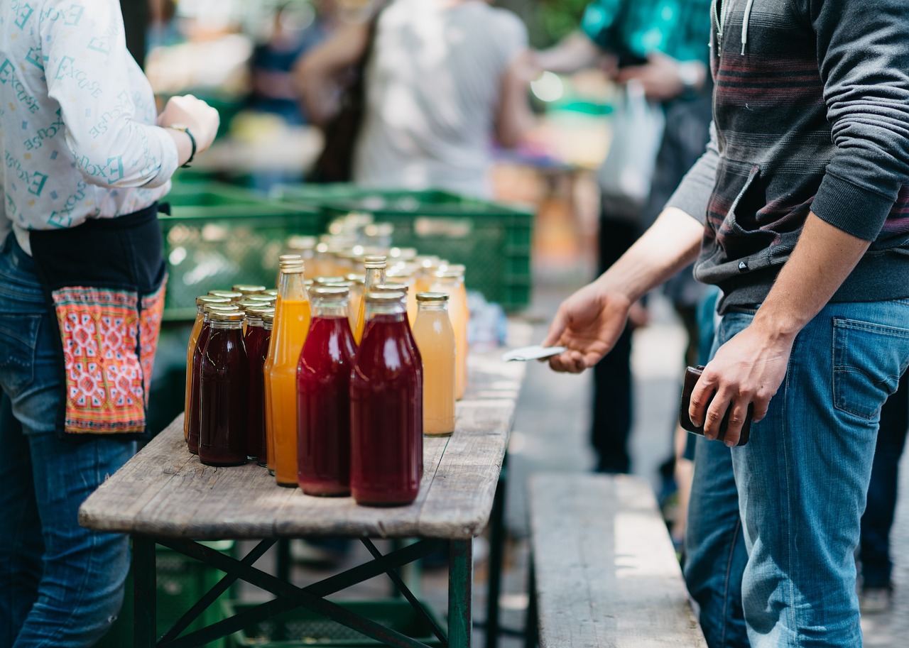 drinks, beverage, table, glass, people, man, woman, buy, sell, vendor, wood